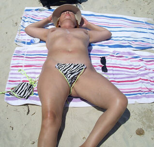 Wifey nude on the beach liking the